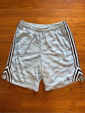 Champion Men’s Light Blue All-Over Logo Mesh Athletic Shorts with Black Stripe